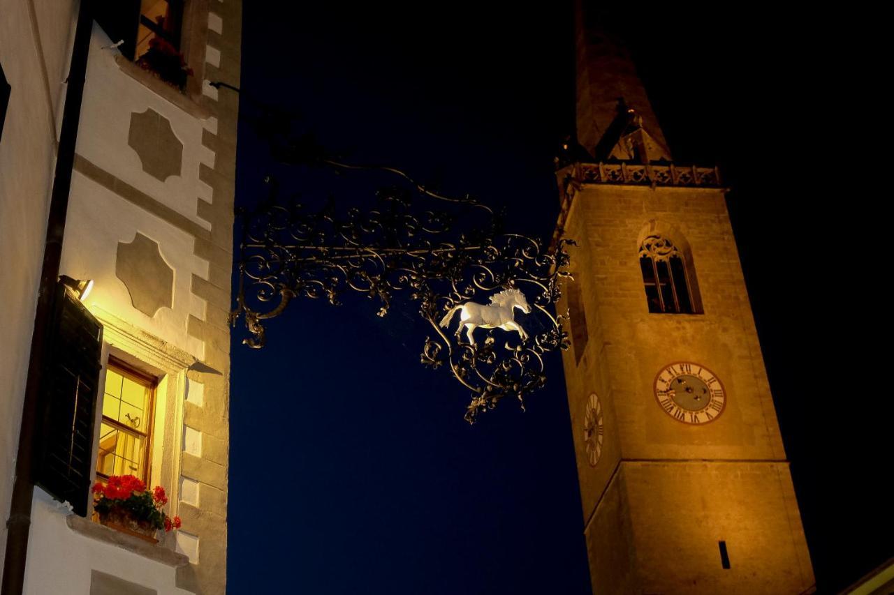 Weisses Roessl Hotel Caldaro Bagian luar foto