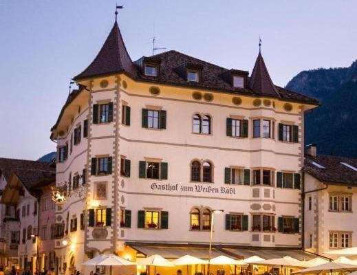 Weisses Roessl Hotel Caldaro Bagian luar foto